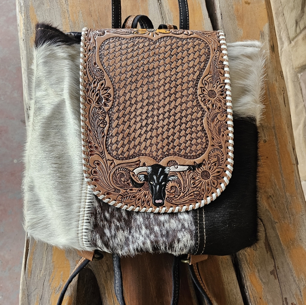 MYRA cowhide/tooled backpack.